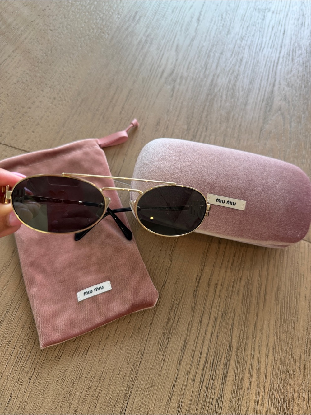 Miu Miu Gold Frame Oval Sunglasses with Dark Lenses and Pink Case/Pouch